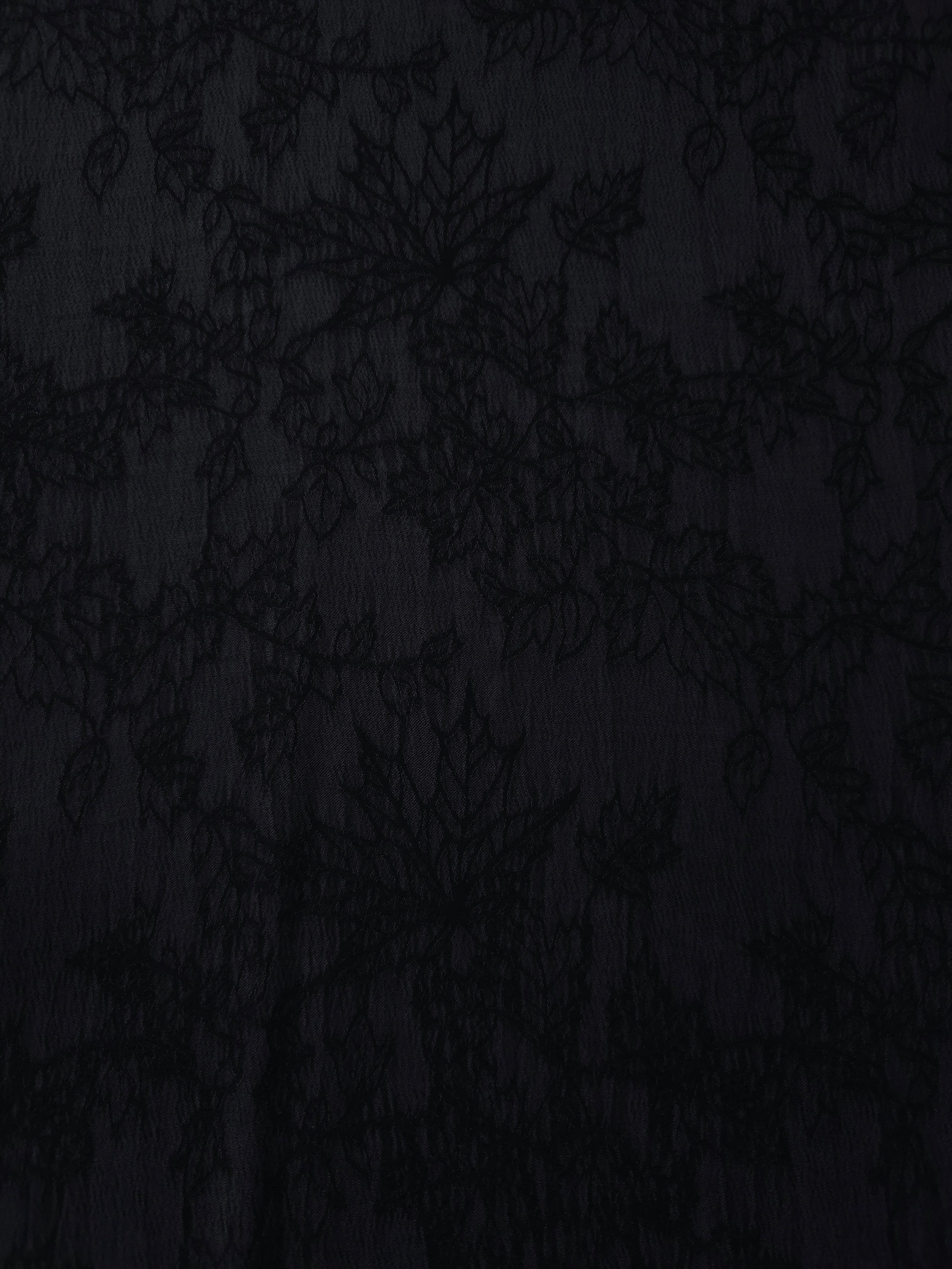 Black botanical floral lyocell viscose jacquard with tonal woven pattern for dresses.
