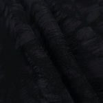 Swirl drape of black floral vine lyocell viscose jacquard with soft tonal contrast.