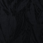 Black large leaf lyocell viscose jacquard with tonal woven pattern for dresses.
