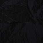 Selvage detail of black large leaf lyocell viscose jacquard for cutting reference.