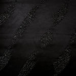 Full view of Metallic Black viscose metallic jacquard in Metallic Brushstroke design