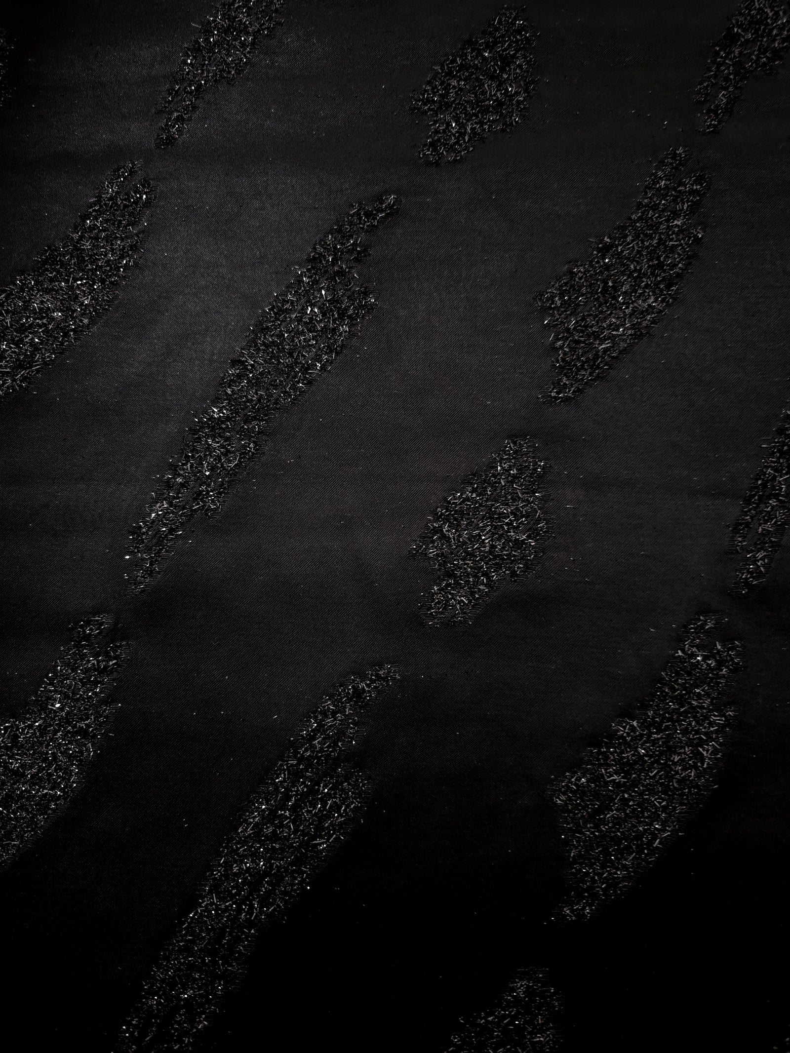 Full view of Metallic Black viscose metallic jacquard in Metallic Brushstroke design