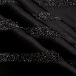 Detail view of Metallic Black viscose metallic jacquard with hairline stripe motif
