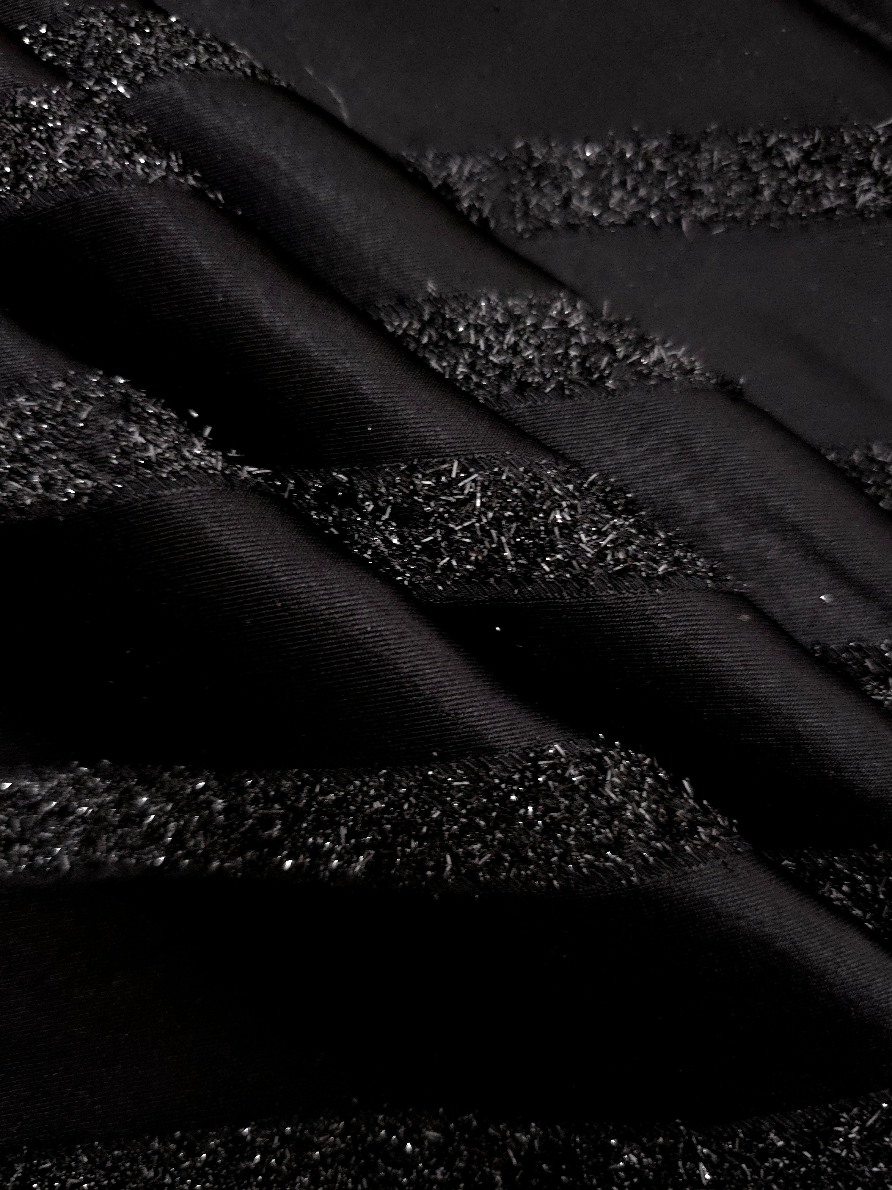Detail view of Metallic Black viscose metallic jacquard with hairline stripe motif
