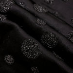 Detail view of Metallic Black viscose metallic jacquard with sprinkle dot motif