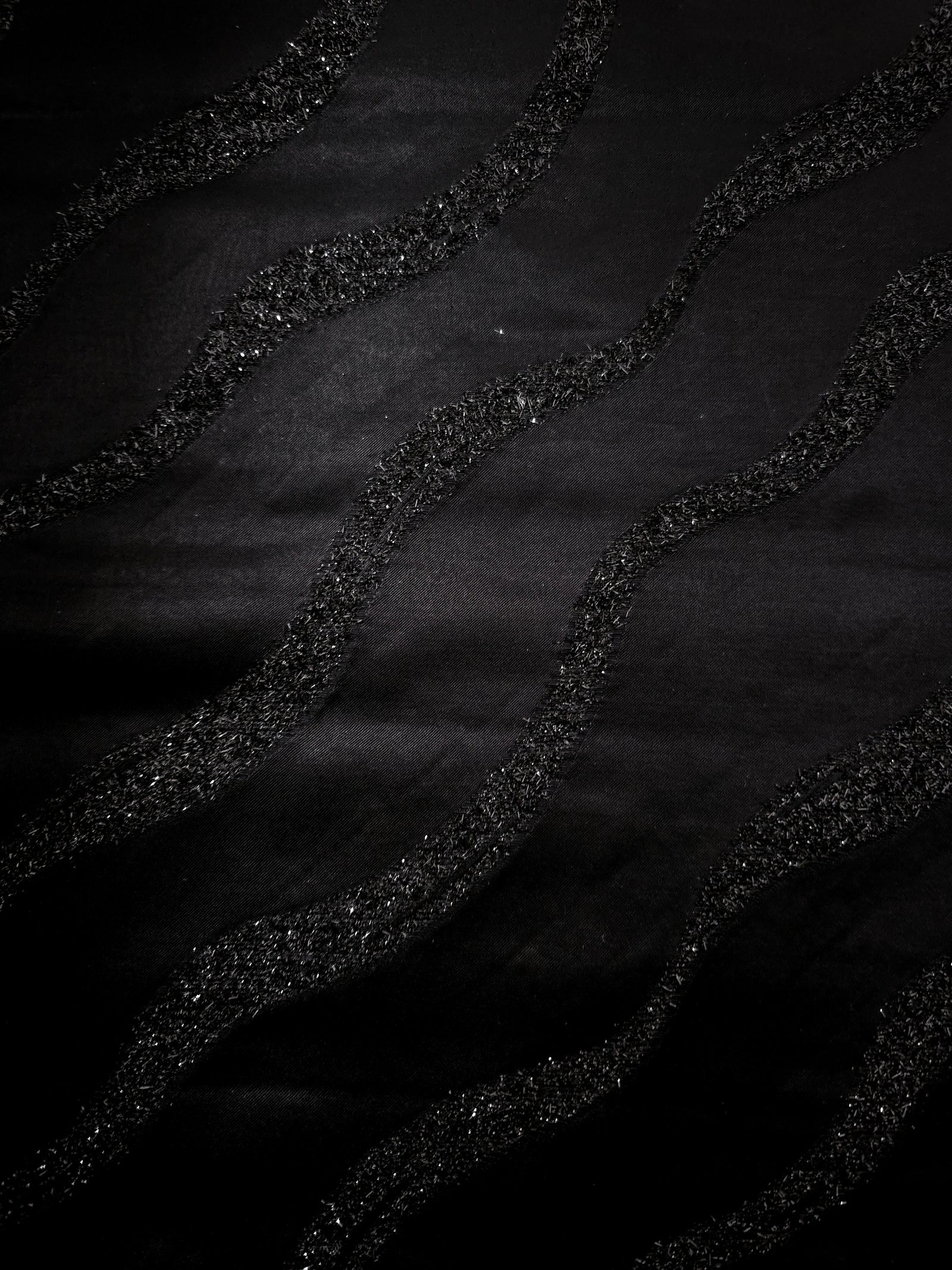Full view of Metallic Black viscose metallic jacquard in Metallic Wavy Stripe design