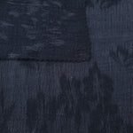 Selvage view of blue lyocell viscose jacquard with floral texture for dresses and jackets.