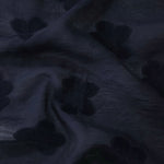 Front and back view of dark blue flower embossed viscose jacquard fabric.