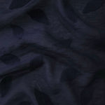 Front and back view of dark blue leaf embossed viscose jacquard fabric.