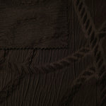 Closeup texture of brown wheat leaf polyester crepe jacquard fabric for tailored garments.