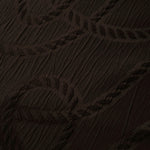 Drape view of brown wheat leaf polyester crepe jacquard fabric for dresses and jackets.