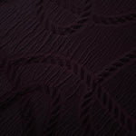 Full view of burgundy wheat leaf polyester crepe jacquard fabric with tonal raised motif.