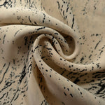 Draped black chiffon rayon Empirme showing soft movement for kaftans and dresses.