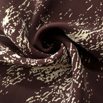Draped brown chiffon rayon Empirme showing fluid movement for kaftans and skirts.