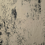 Wide view of black graphic print rayon chiffon fabric by the meter.
