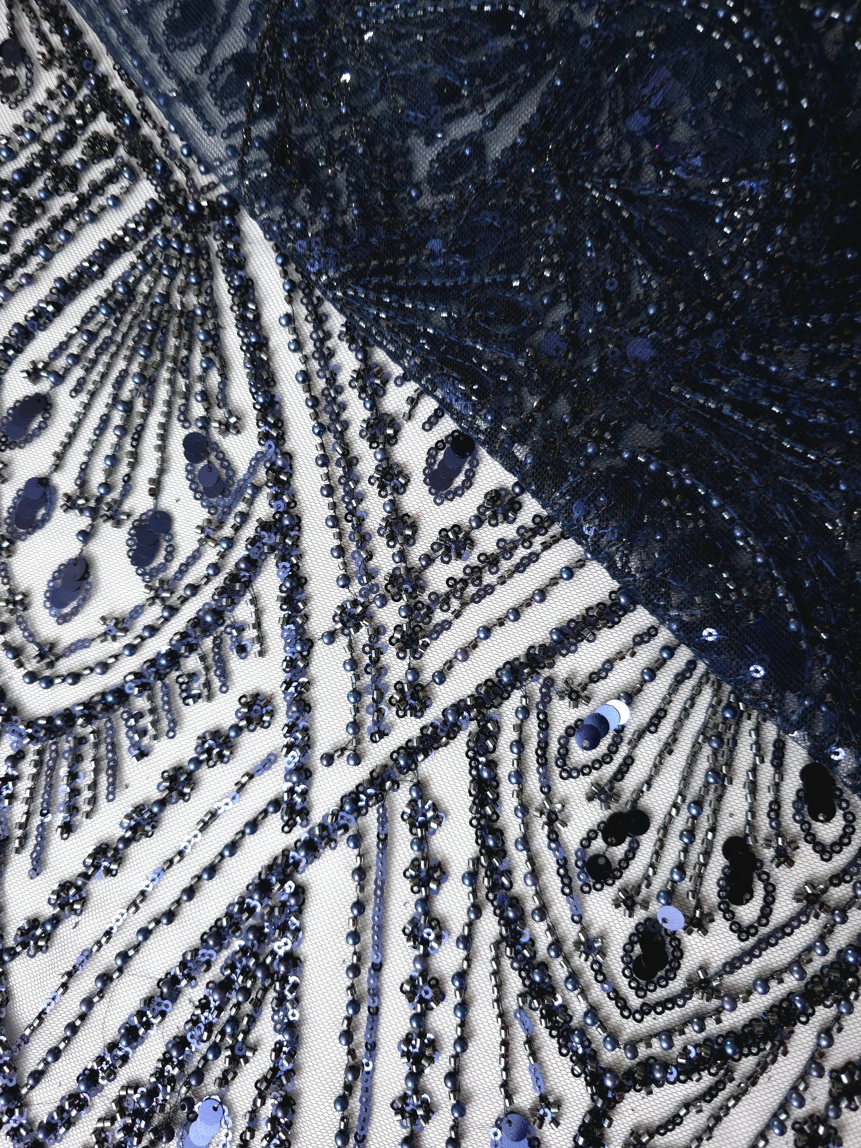 Steel Blue Art Deco Cascade couture lace in a softly folded couture netting presentation, highlighting cascading ornamental details and Deco-inspired beadwork.