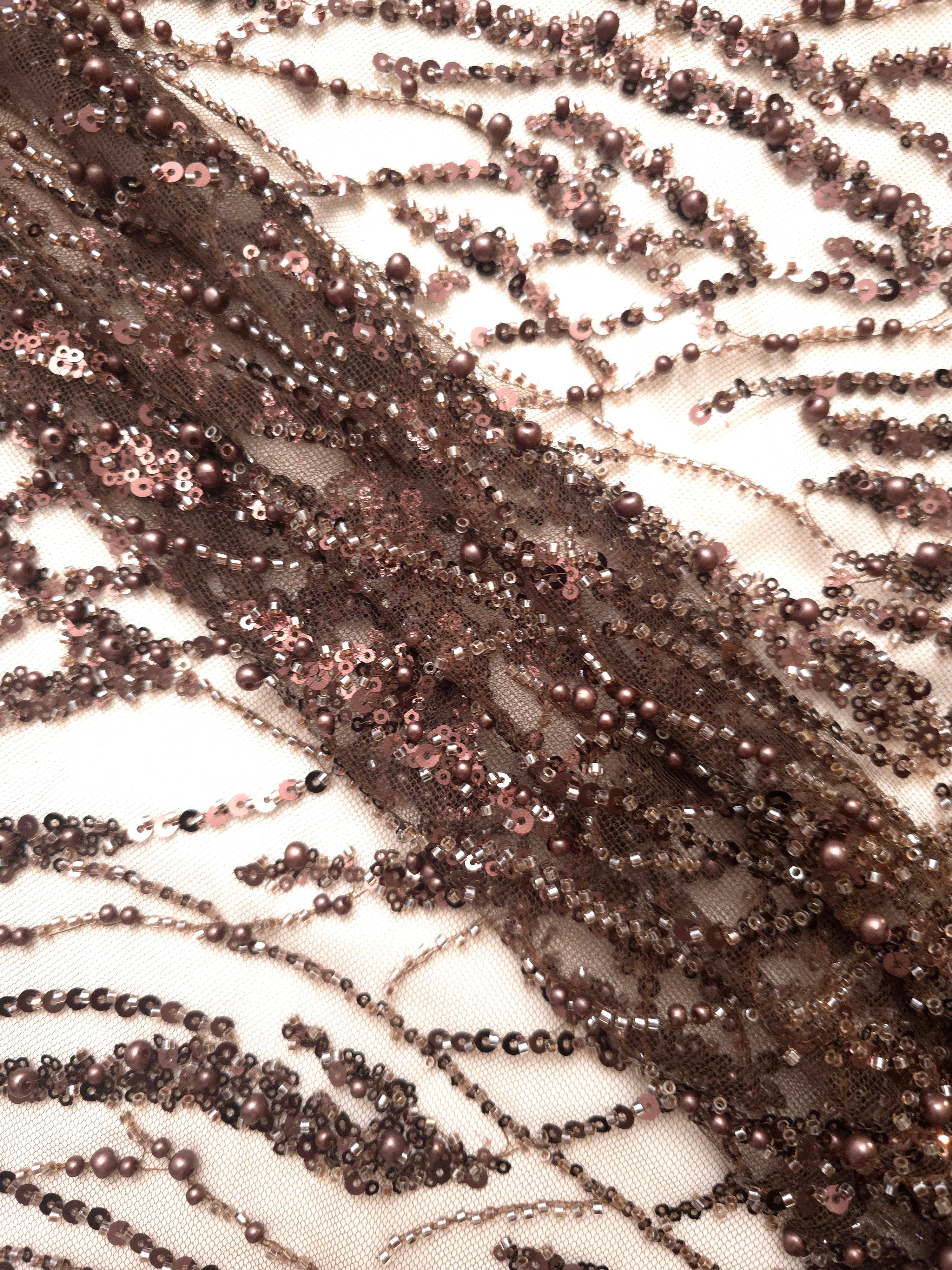 Close-up of Antique Bronze Liquid Wave beaded lace showing sparkling sequin lace detail, with flowing ripples and curved sequin embellishment.