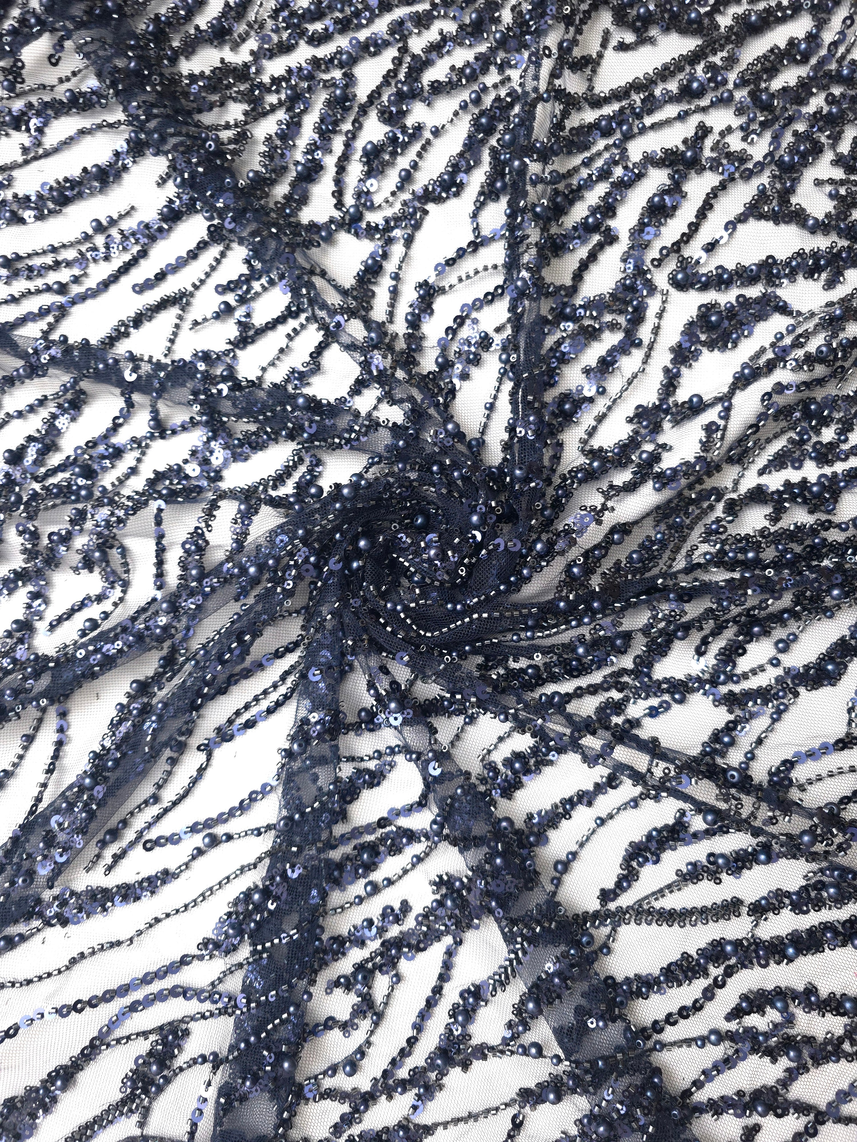 Midnight Blue Liquid Wave couture lace in a soft gathered lace drape presentation, highlighting flowing ripples and curved sequin embellishment.