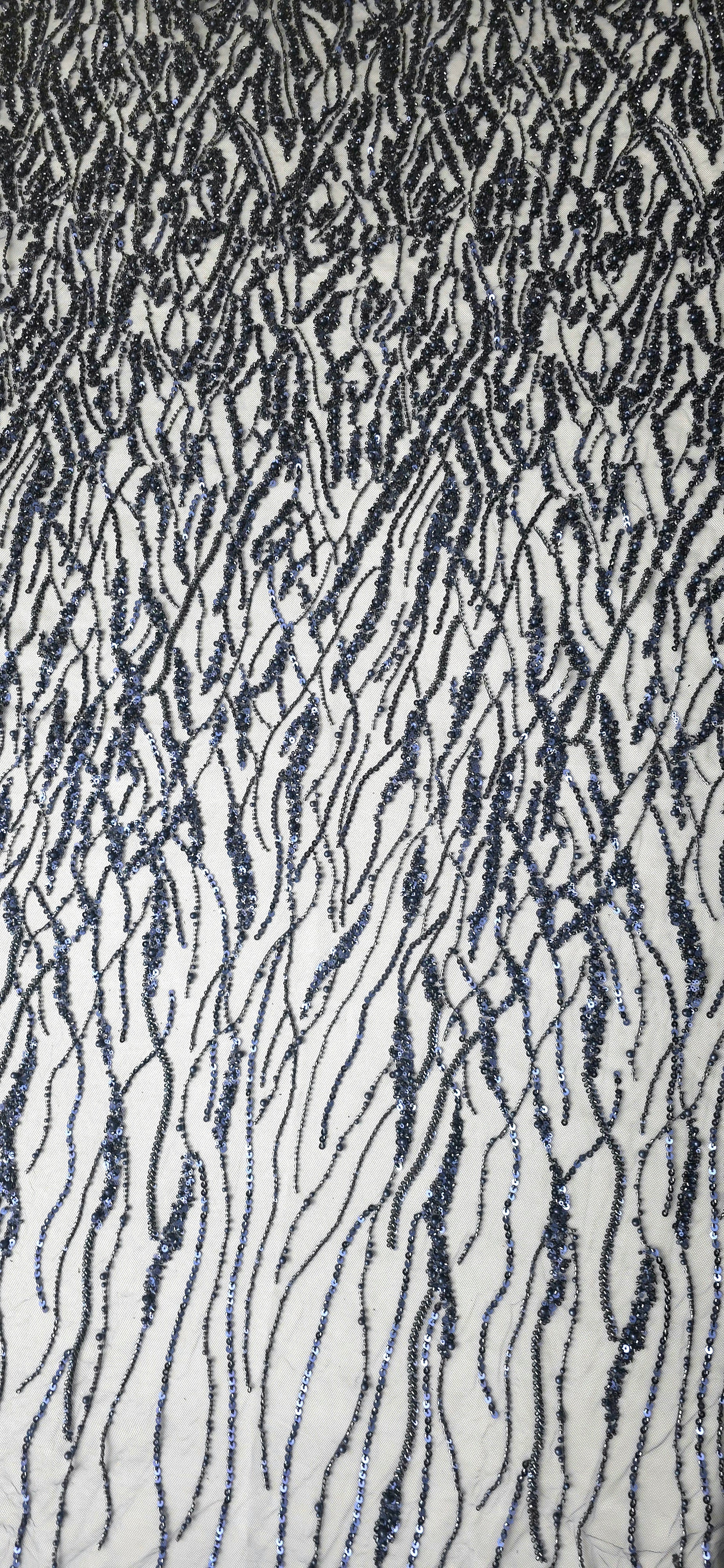 Midnight Blue Liquid Wave embroidered lace showing vertical wave sequin pattern across a decorative mesh with flowing ripples and curved sequin embellishment.