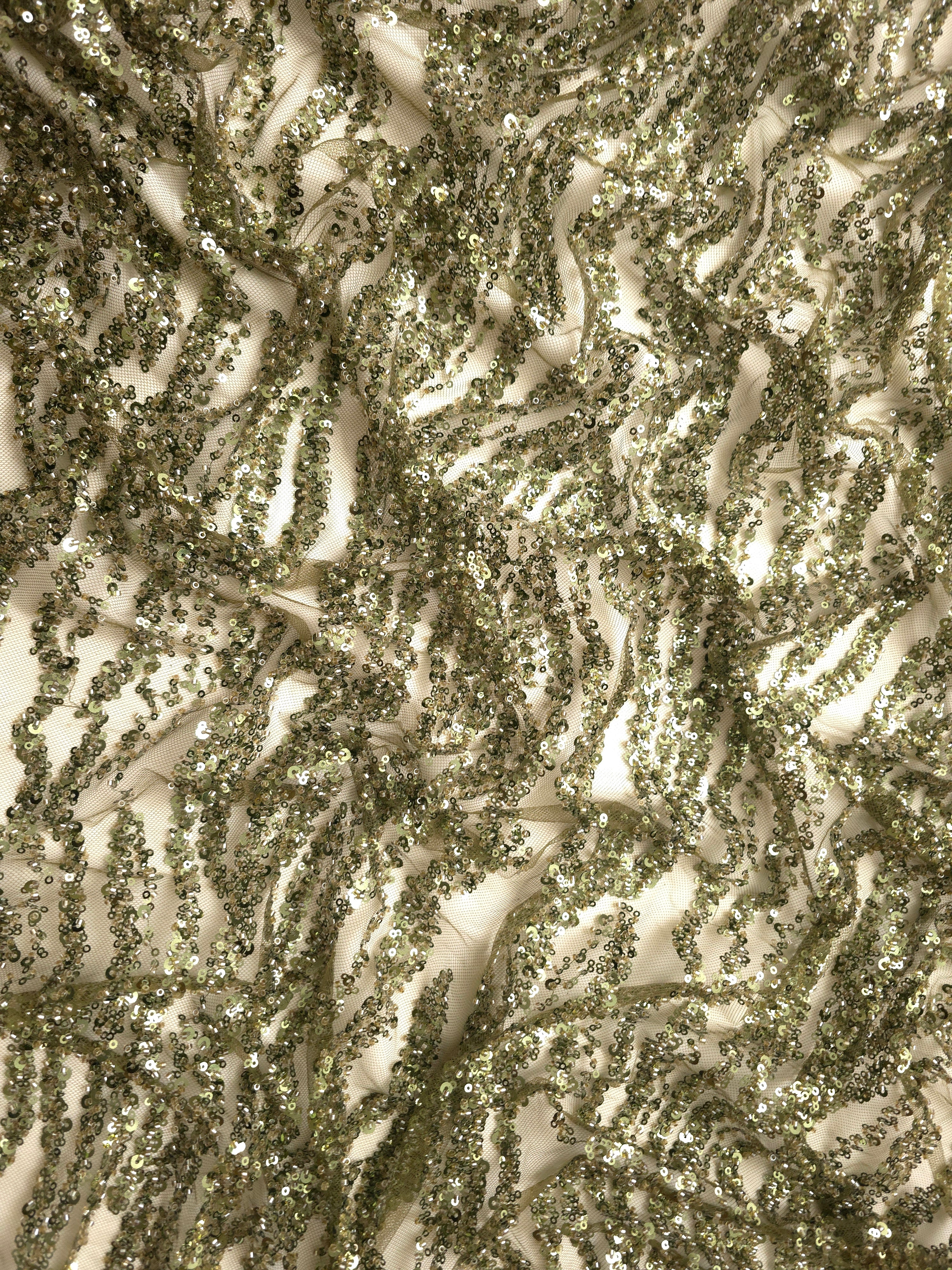 Ruched olive green sequin lace with closely packed rippling texture and pronounced draped ridges.