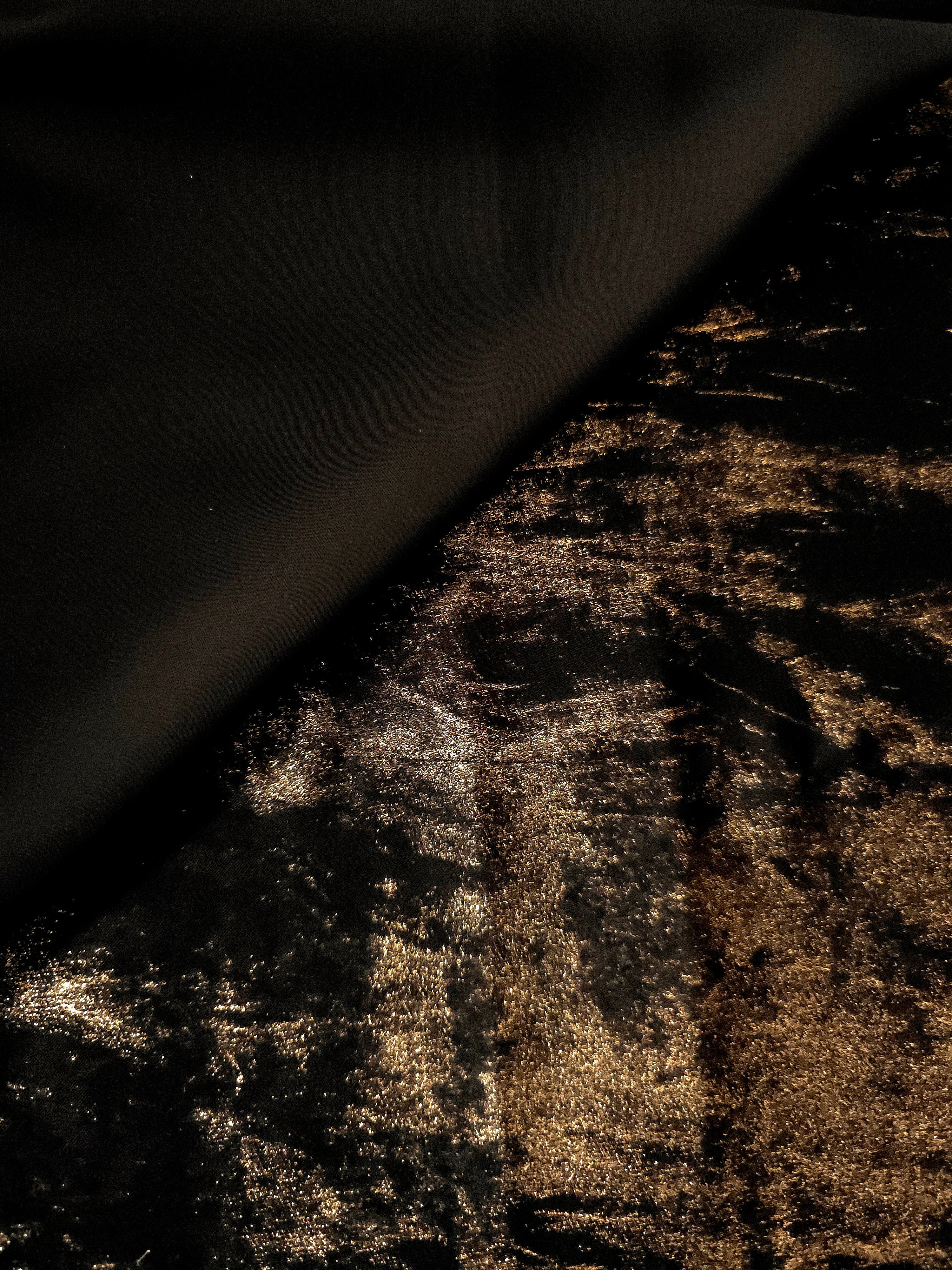 Flowing folds of Antique Gold Lurex Italiano fabric highlighting drape for abayas, kaftans and dresses.