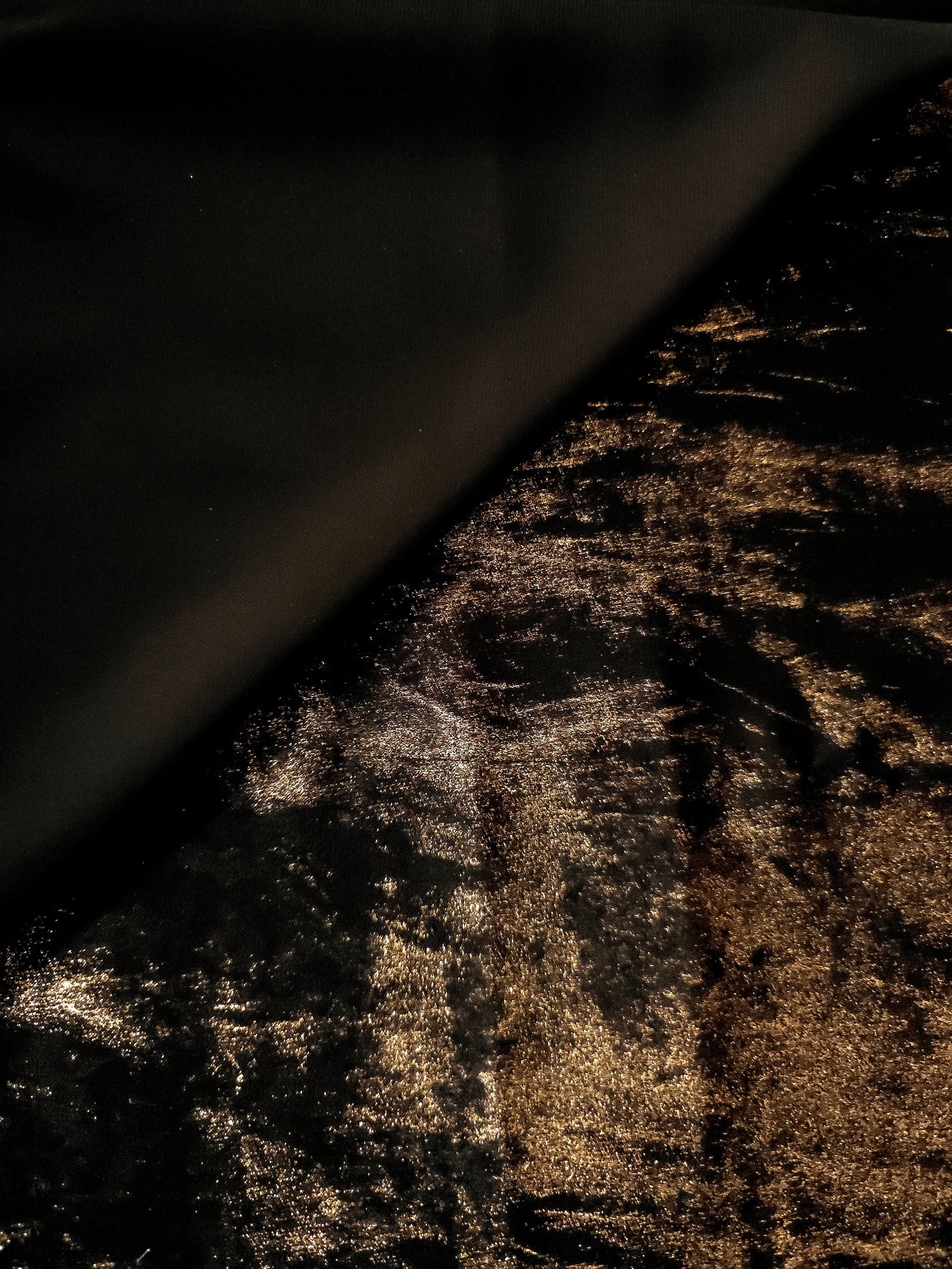 Flowing folds of Antique Gold Lurex Italiano fabric highlighting drape for abayas, kaftans and dresses.