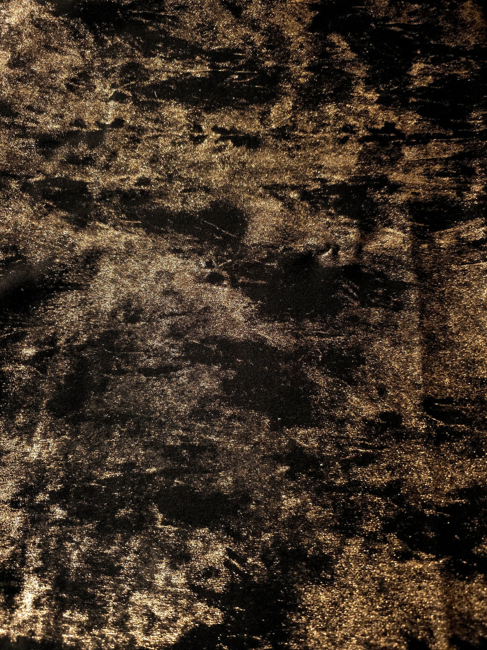 Flat view of Antique Gold Lurex Italiano fabric showing its metallic foil surface for luxury apparel.