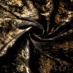 Rosette drape of Antique Gold Lurex Italiano fabric emphasizing shimmer for kaftans and occasionwear.