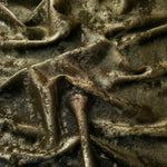 Flowing folds of Antique Khaki Lurex Italiano fabric highlighting drape for abayas, kaftans and dresses.