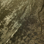 Macro close-up of Antique Khaki Lurex Italiano fabric revealing metallic texture for designer apparel.