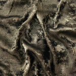 Flowing folds of Antique Olive Lurex Italiano fabric highlighting drape for abayas, kaftans and dresses.