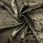 Rosette drape of Antique Olive Lurex Italiano fabric emphasizing shimmer for kaftans and occasionwear.