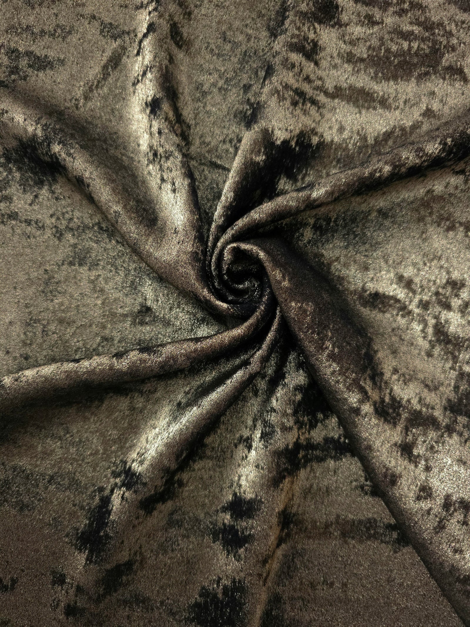 Rosette drape of Antique Olive Lurex Italiano fabric emphasizing shimmer for kaftans and occasionwear.
