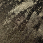 Macro close-up of Antique Olive Lurex Italiano fabric revealing metallic texture for designer apparel.