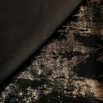 Flowing folds of Black Bronze Lurex Italiano fabric highlighting drape for abayas, kaftans and dresses.