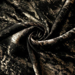 Rosette drape of Black Bronze Lurex Italiano fabric emphasizing shimmer for kaftans and occasionwear.