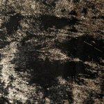 Macro close-up of Black Bronze Lurex Italiano fabric revealing metallic texture for designer apparel.