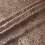 Blush Taupe Lurex Italiano fabric in diagonal folds showing metallic sheen and drape for eveningwear.