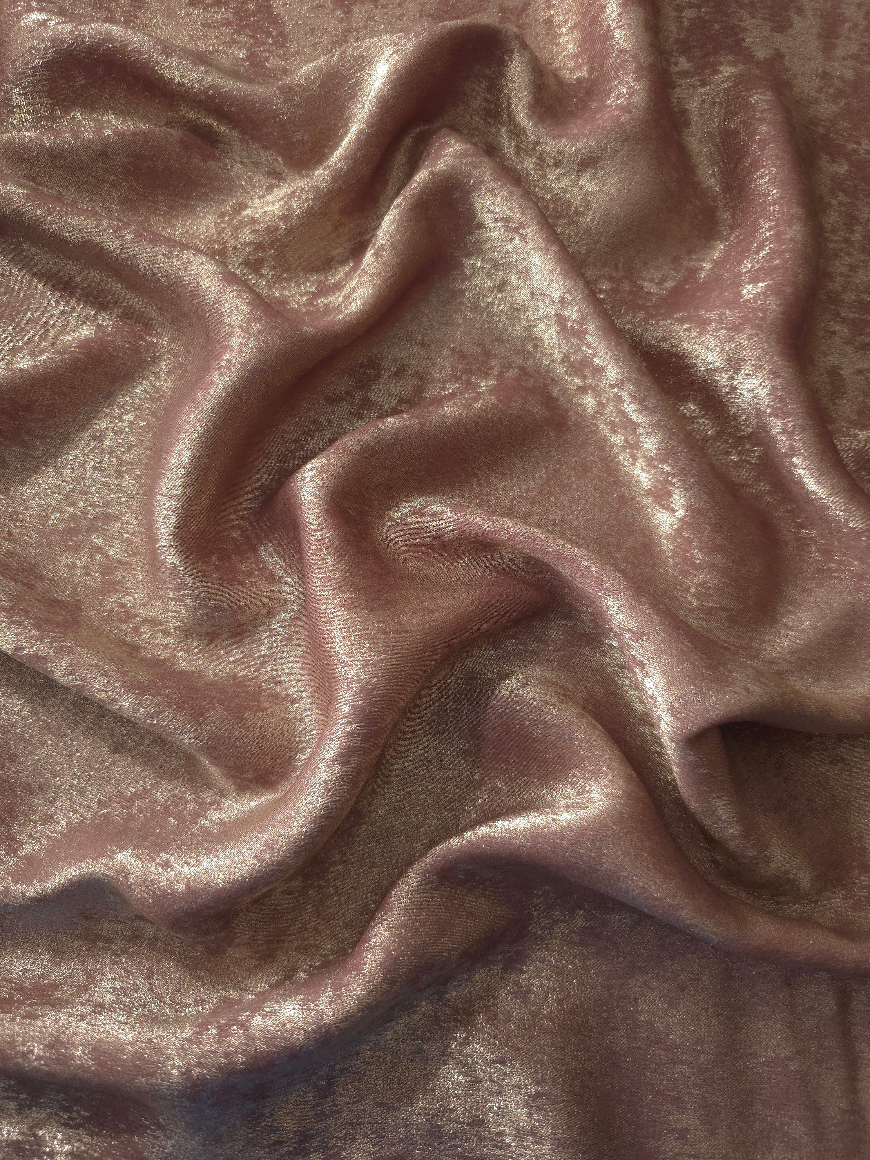 Flowing folds of Blush Taupe Lurex Italiano fabric highlighting drape for abayas, kaftans and dresses.
