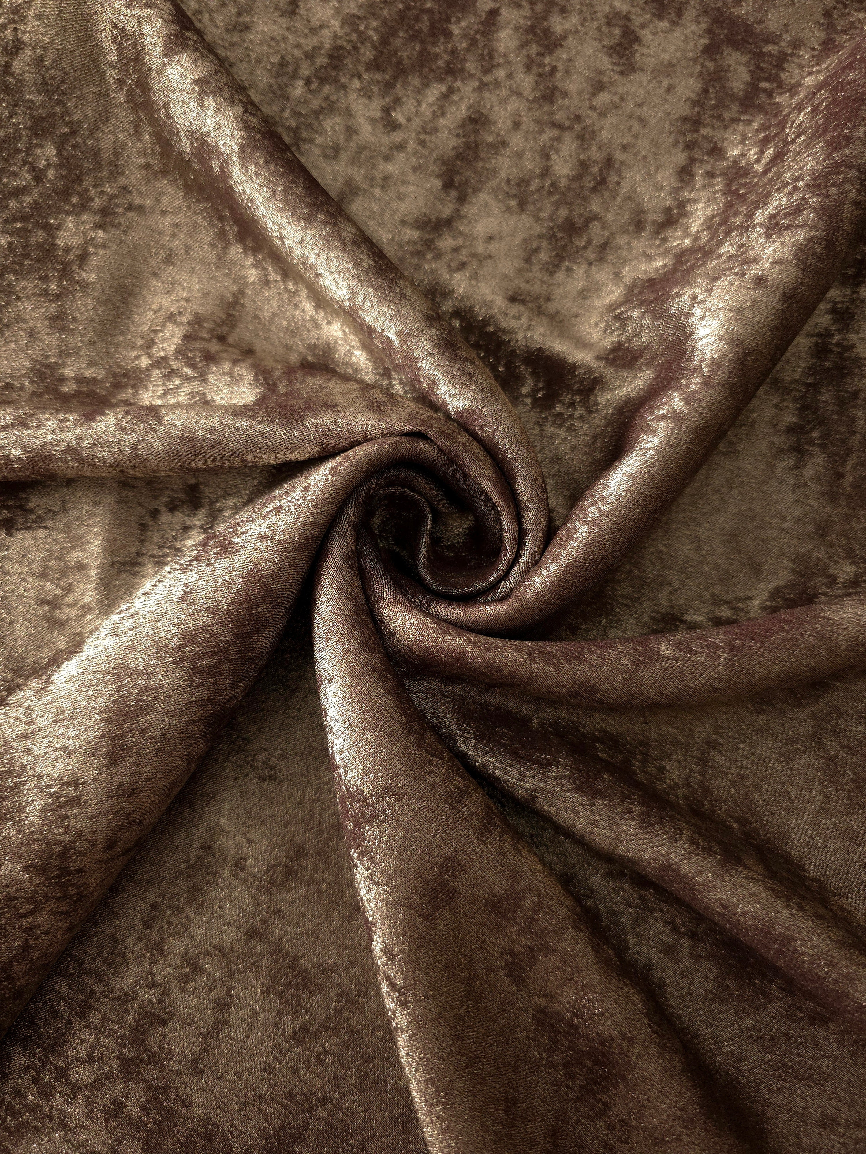 Rosette drape of Bronze Taupe Lurex Italiano fabric emphasizing shimmer for kaftans and occasionwear.