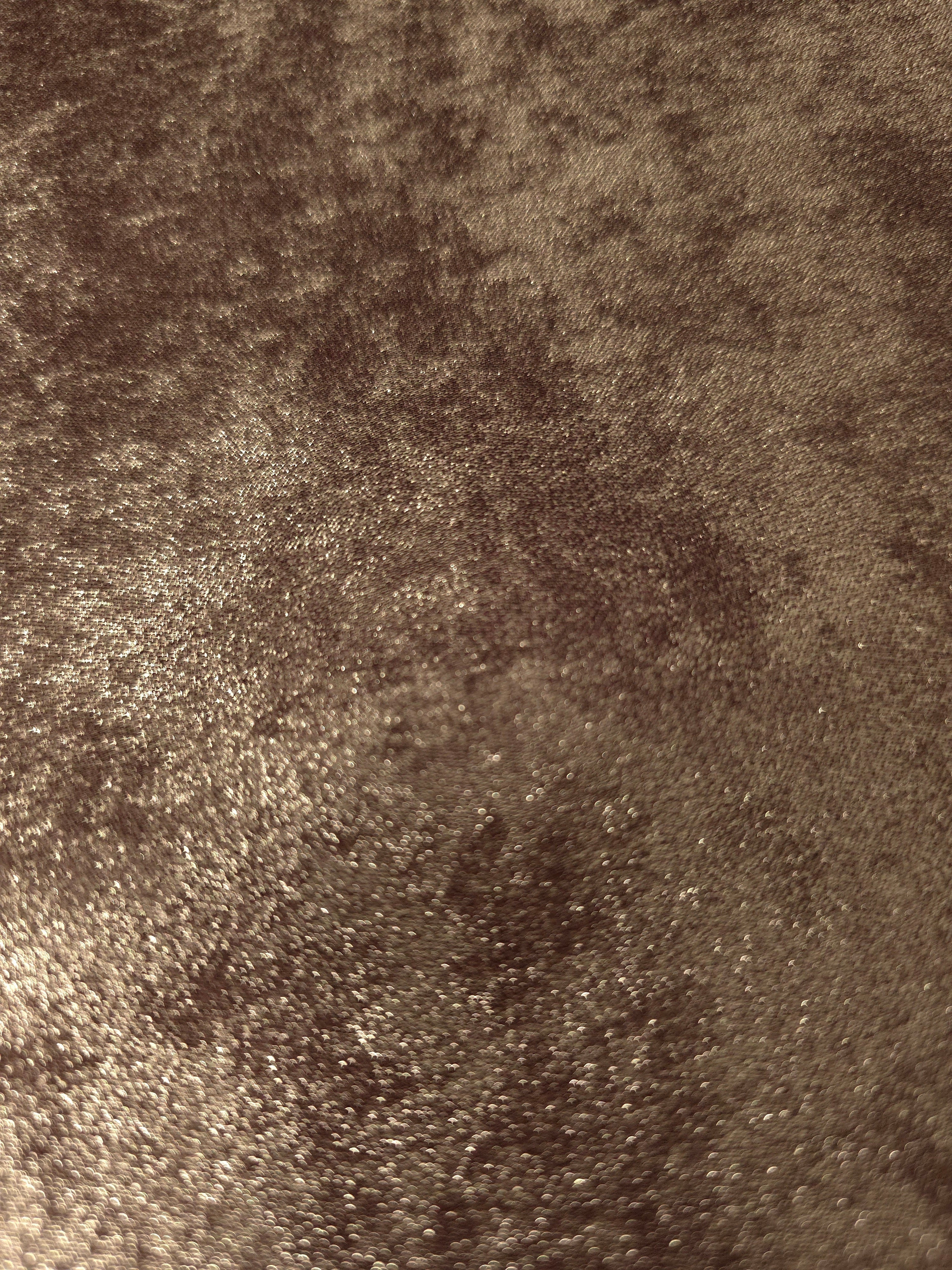 Macro close-up of Bronze Taupe Lurex Italiano fabric revealing metallic texture for designer apparel.