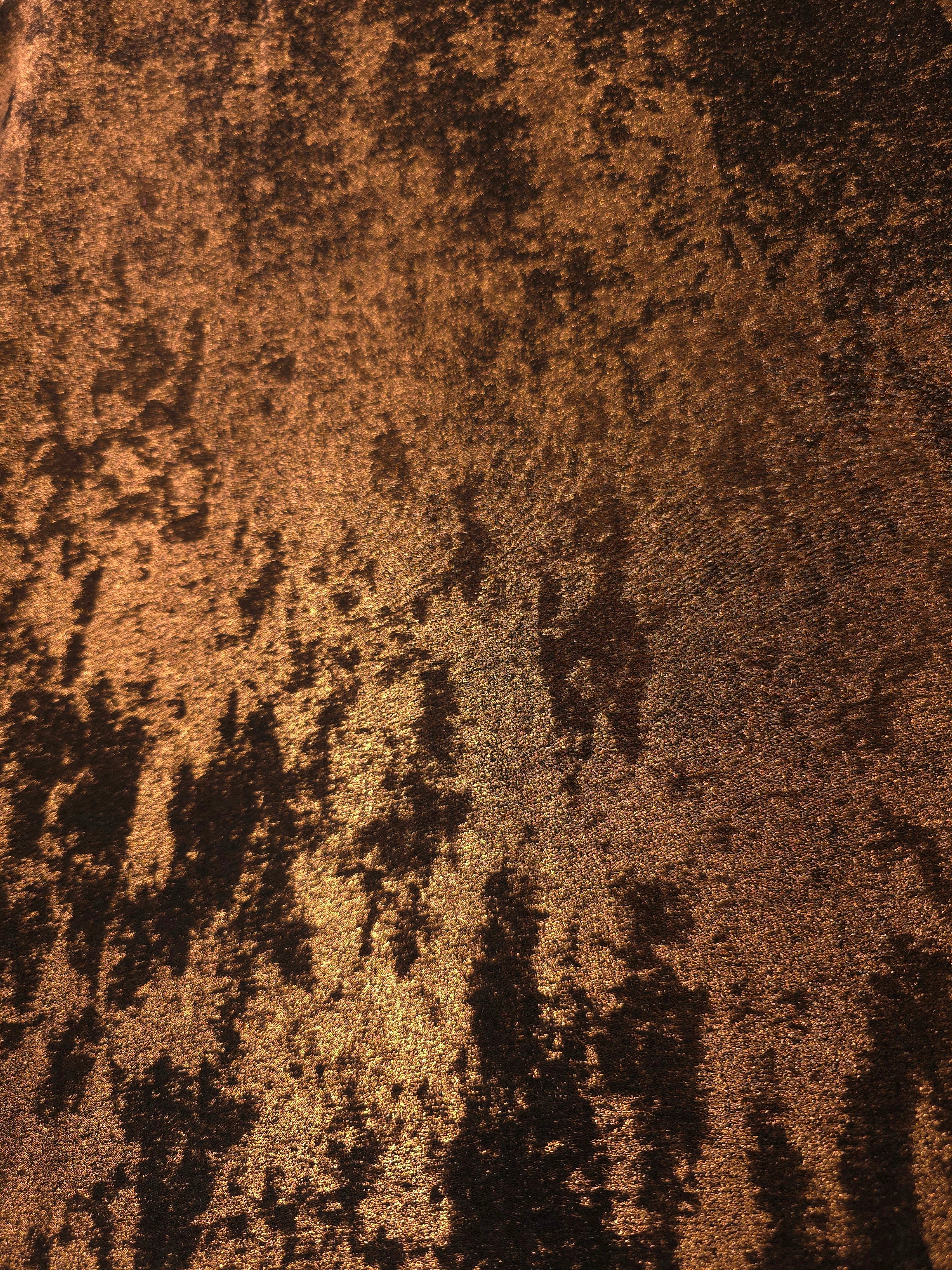 Flat texture of Burnished Copper Lurex Italiano metallic fabric for luxury fashion