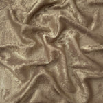 Flowing folds of Champagne Beige Lurex Italiano fabric highlighting drape for abayas, kaftans and dresses.
