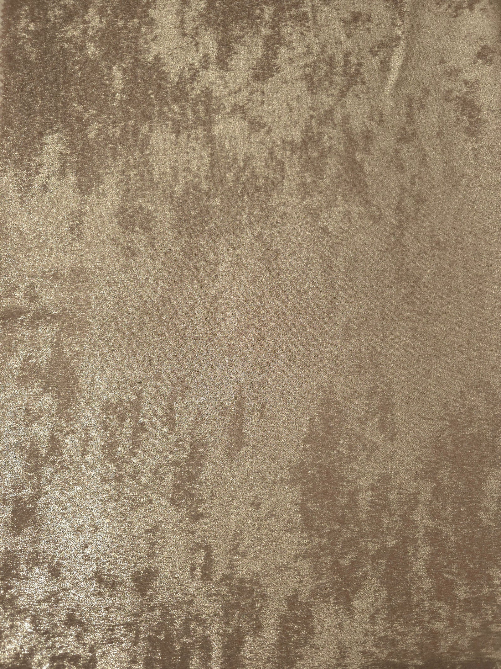 Flat view of Champagne Beige Lurex Italiano fabric showing its metallic foil surface for luxury apparel.