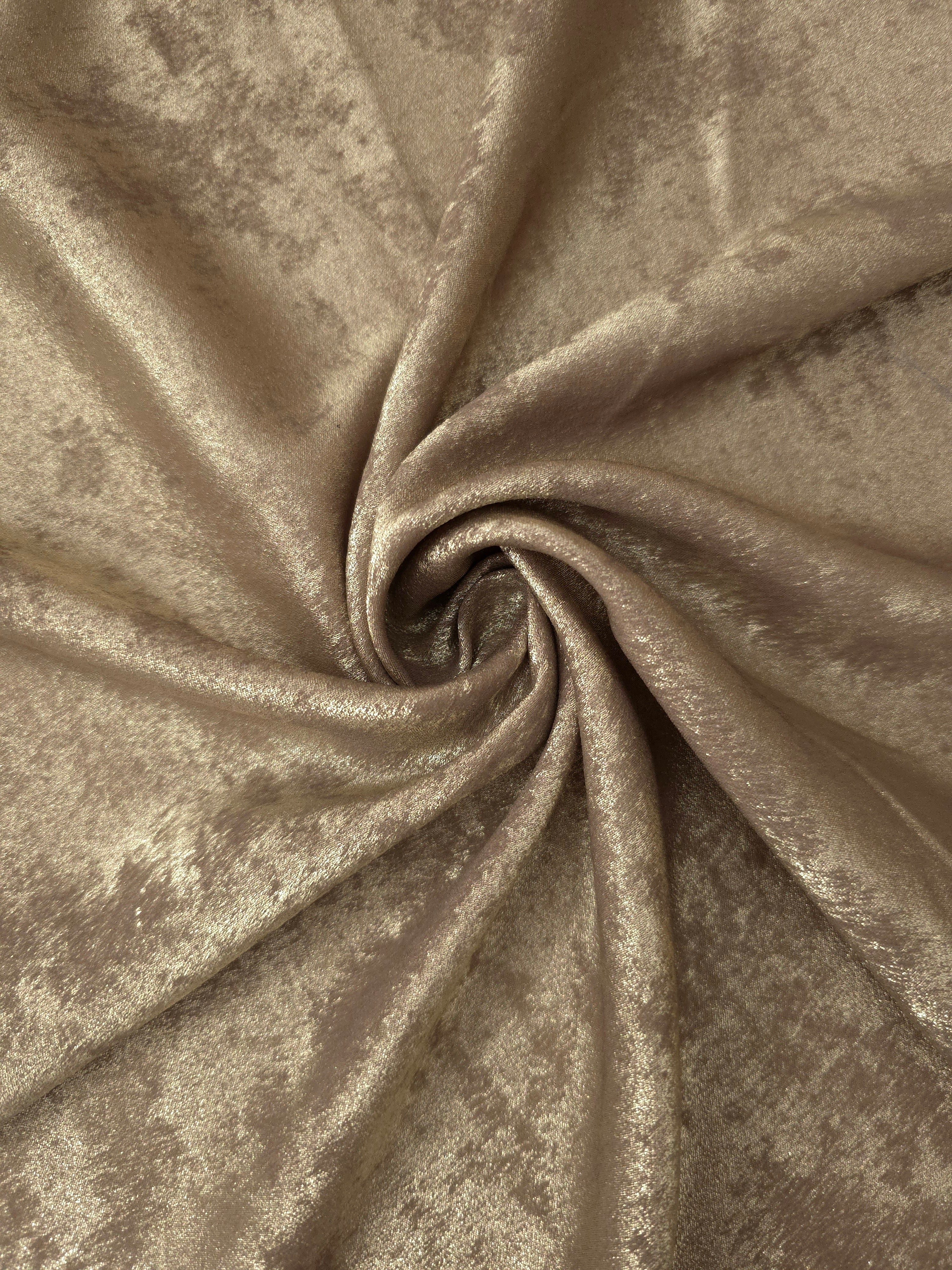 Rosette drape of Champagne Beige Lurex Italiano fabric emphasizing shimmer for kaftans and occasionwear.