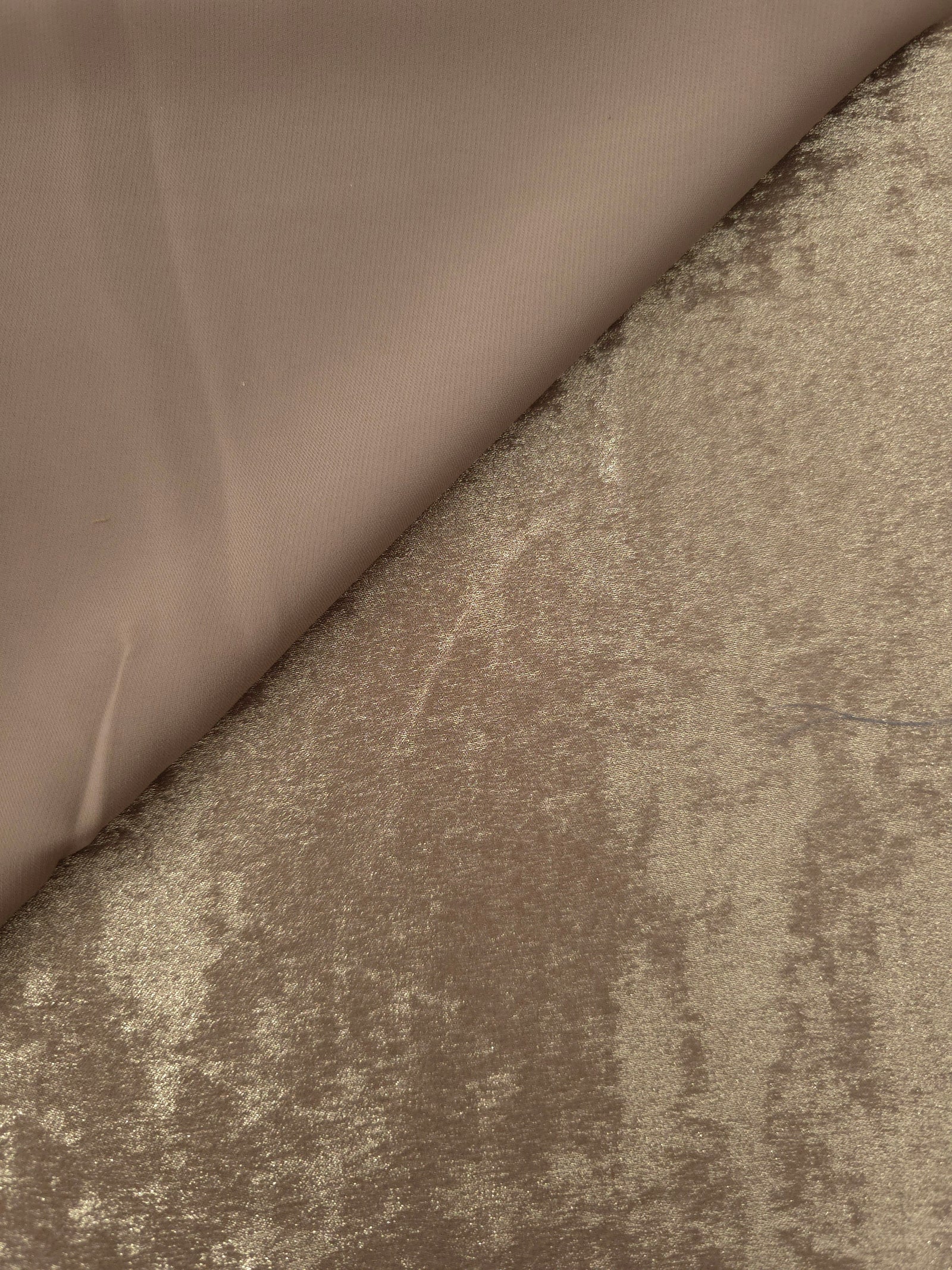 Reverse side of Champagne Beige Lurex Italiano fabric showing the backing and metallic finish for garment production.