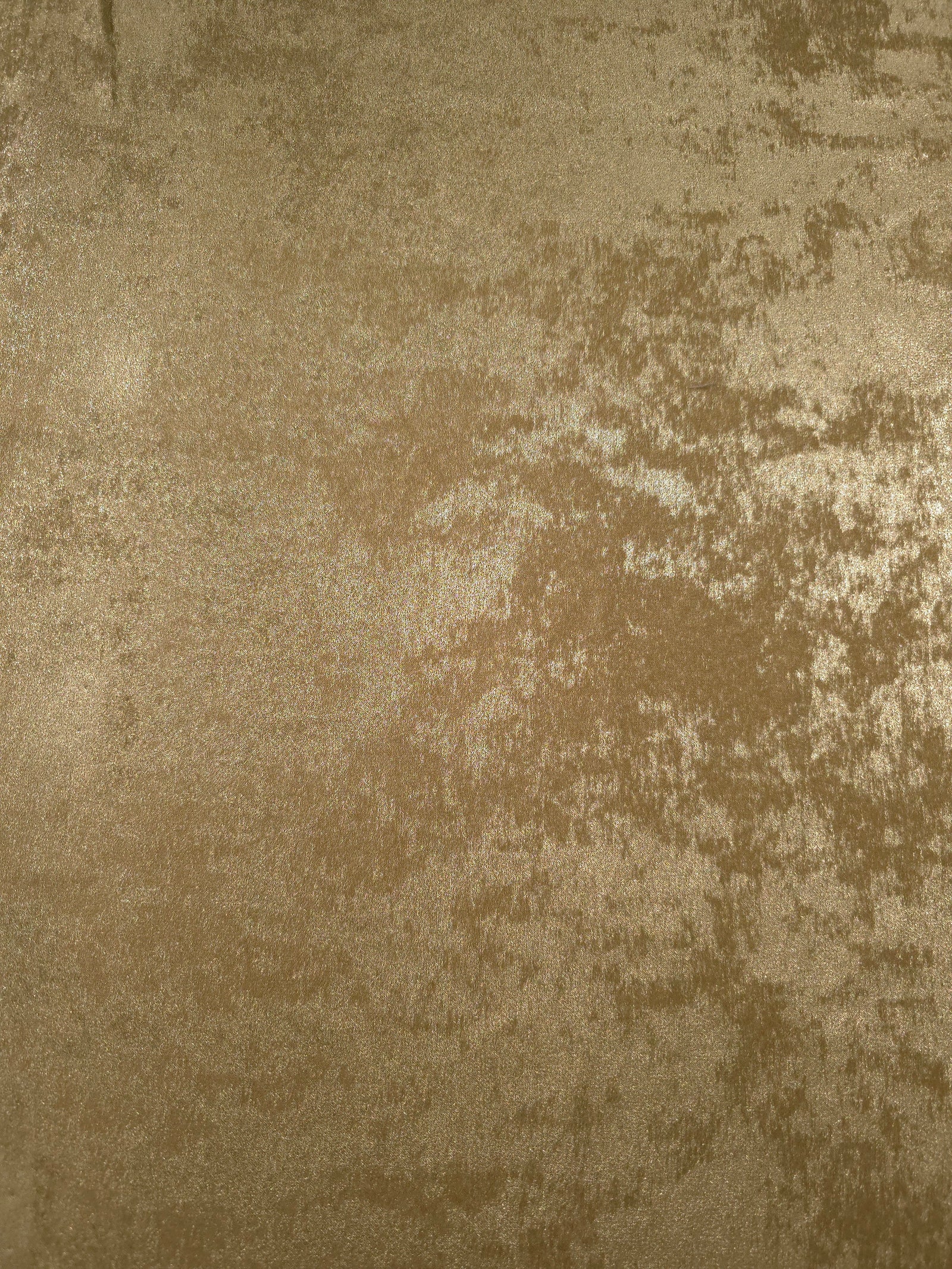 Flat view of Champagne Gold Lurex Italiano fabric showing its metallic foil surface for luxury apparel.