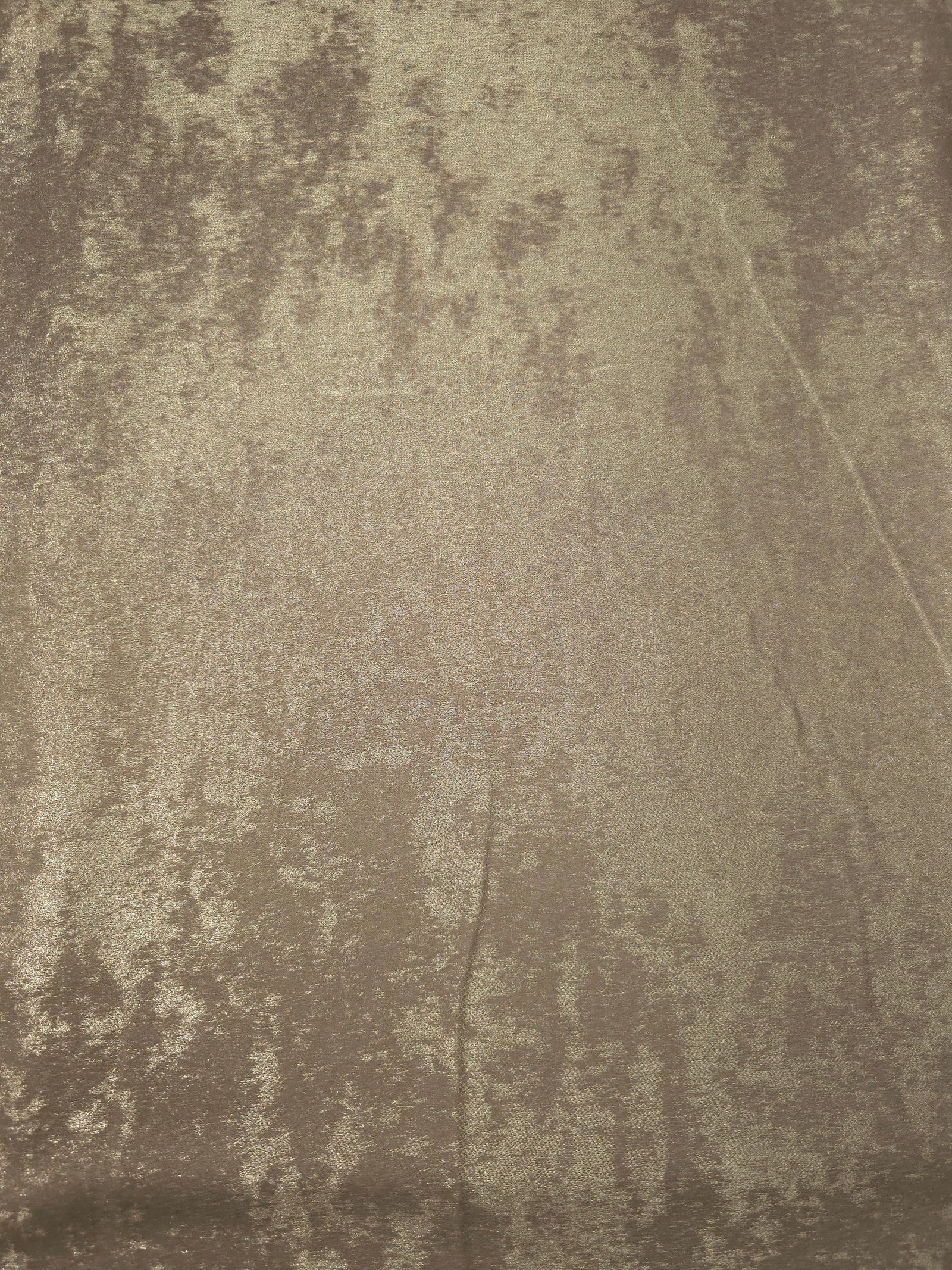 Flat view of Champagne Taupe Lurex Italiano fabric showing its metallic foil surface for luxury apparel.