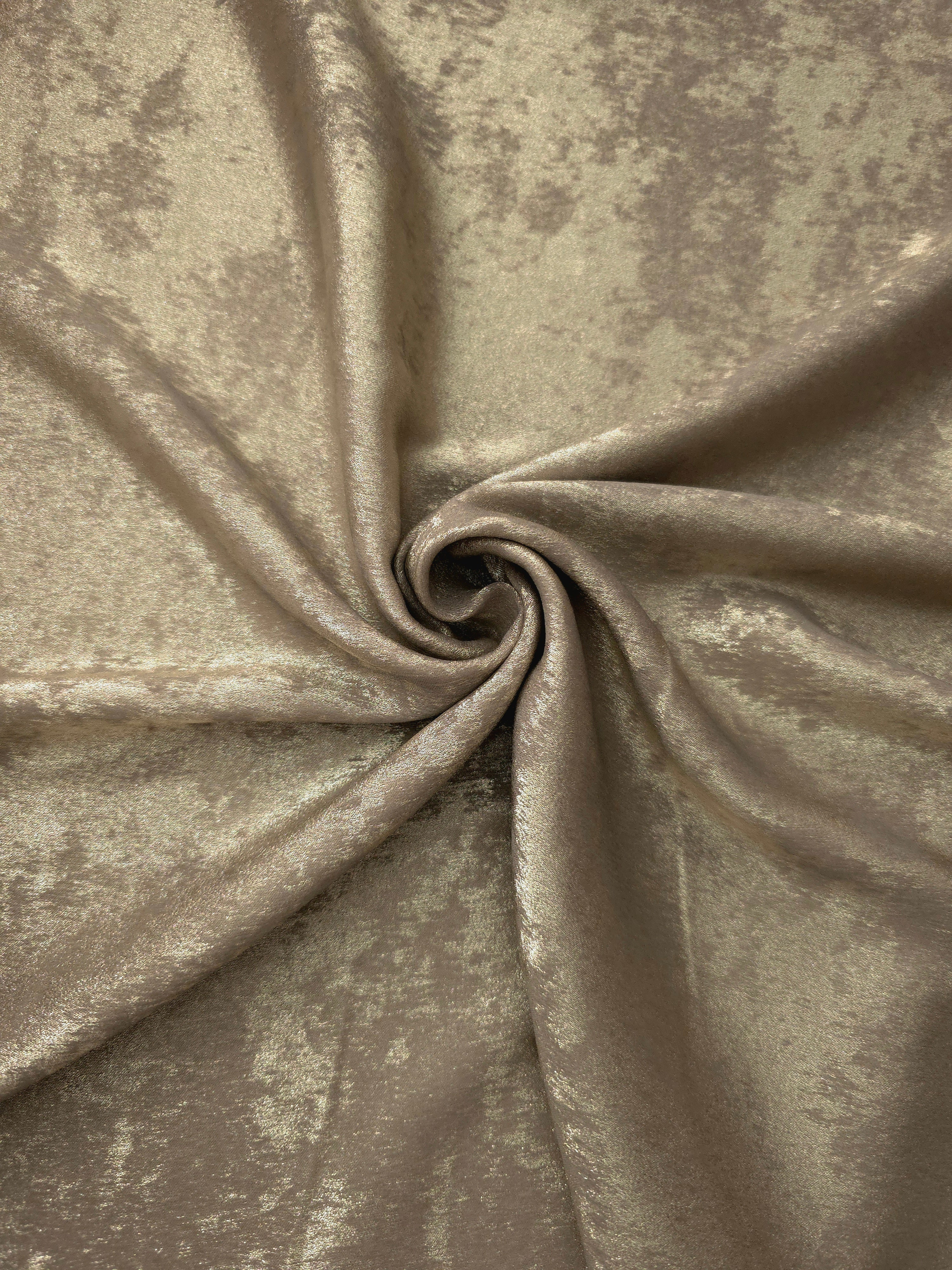 Rosette drape of Champagne Taupe Lurex Italiano fabric emphasizing shimmer for kaftans and occasionwear.