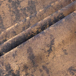 Cocoa Bronze Lurex Italiano fabric in diagonal folds showing metallic sheen and drape for eveningwear.